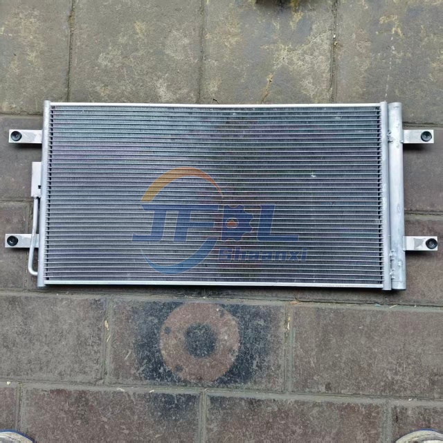 Sinotruk Condenser Assembly (NJ17 with Fan) New Replacement/Repair Part WG1671820069 for Howo A7, T7H, T5G, And TX Models.